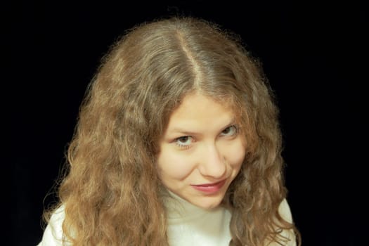 Portrait of young woman with long brown nature hair