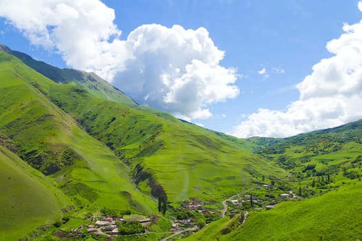 Summer landscape with Russian Caucasus green mountains