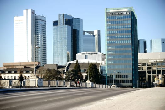 Frankfurt,Germany - January 05,2017: Road traffic and pedestrians cross the Untermain Bridge in the direction of Sachsenhausen and downtown on January 5,2017 in Frankfurt.