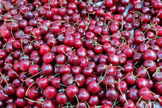 Image of background fresh dark red cherry