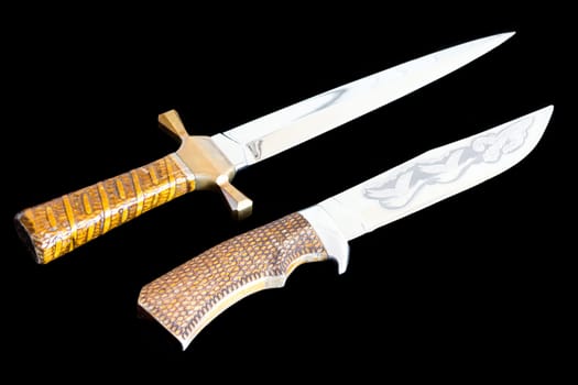 Photo of cold weapon on black background