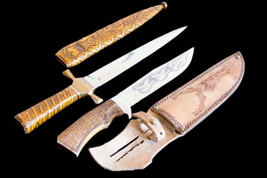 Photo of cold weapon on black background