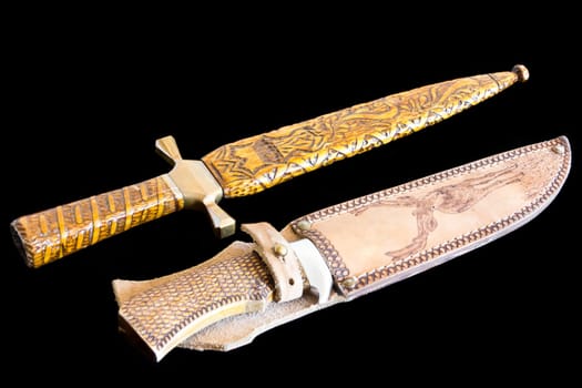 Photo of cold weapon on black background