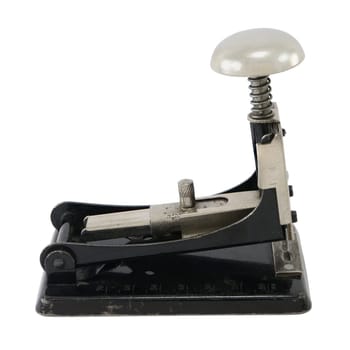Old-fashioned black metal stapler, isolated on white.