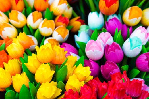 Wooden tulips souvenirs painted in vivid colours in Amsterdam, the Netherlands