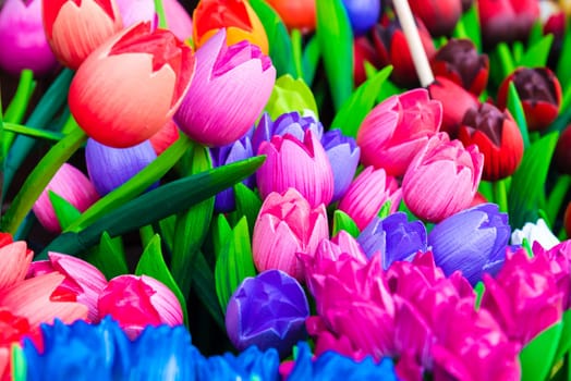 Wooden tulips souvenirs painted in vivid colours in Amsterdam, the Netherlands