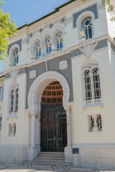 FARO, PORTUGAL - OCTOBER 01, 2016: Banco de Portugal Building in the city of Faro, Algarve, Portugal. Neo-Manueline Revivalist Architecture, with Islamized suggestions at the front door.