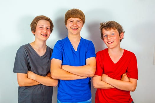 three happy joyful friends enjoy life