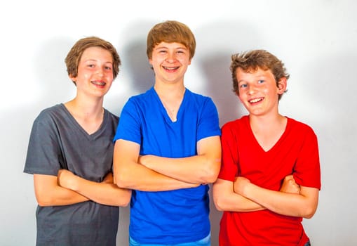 three happy joyful friends enjoy life