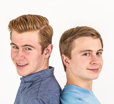 portrait of handsome brothers posing in studio
