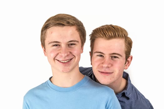 portrait of handsome brothers posing in studio