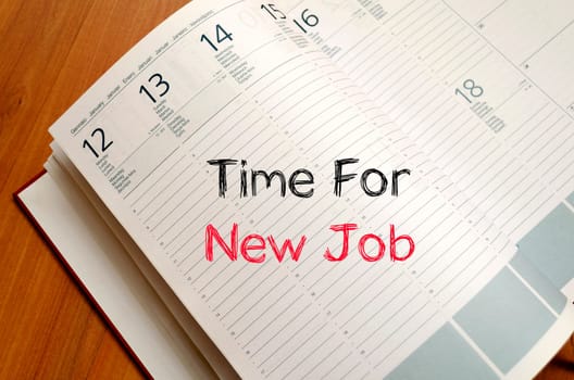 Time for new job text concept write on notebook