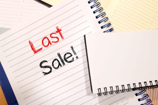 Last sale text concept write on notebook