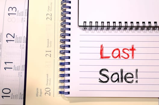 Last sale text concept write on notebook