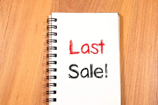 Last sale text concept write on notebook