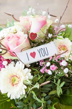 Colourful bouquet of flowers with pink roses and gerbera