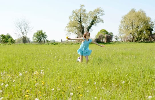 Girls with dandelions