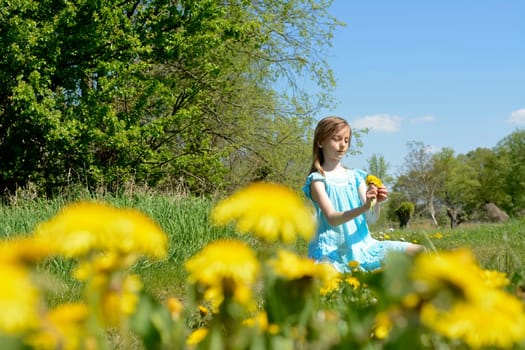 Girls with dandelions