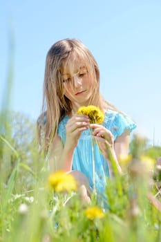 Girls with dandelions