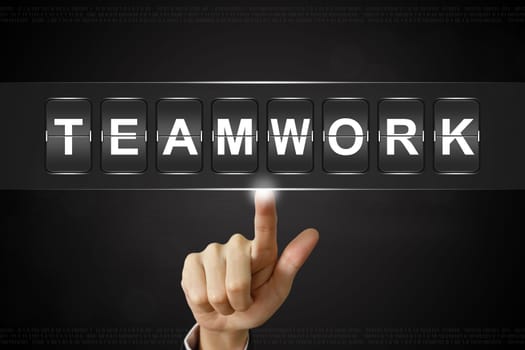 business hand pushing teamwork on Flipboard Display