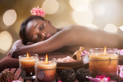 Side view portrait of smiling young woman relaxing at beauty spa