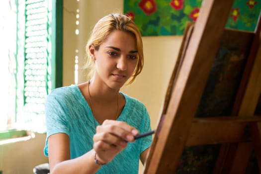 School of art, college of arts, education for young students. Happy young woman smiling, learning to paint for job, profession, hobby
