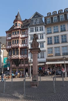 The Minervabrunnen on the east side of Roemerberg, Frankfurt, Germany