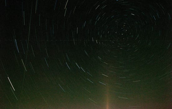 long exposure of star trails with retro effect high grain