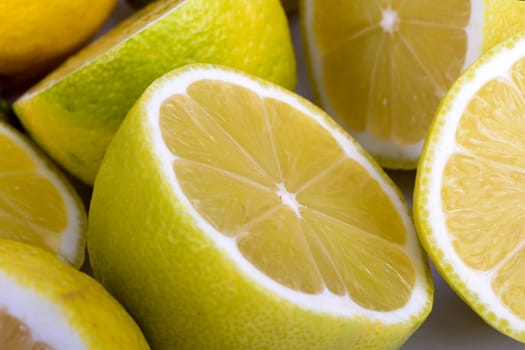 Cut lemons and isolated with white background