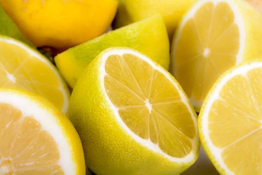 Cut lemons and isolated with white background
