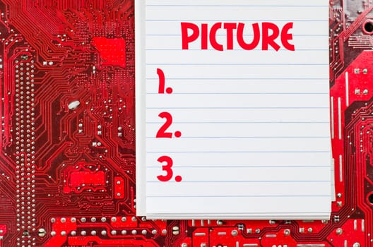 Red old dirty computer circuit board and text concept