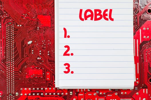 Red old dirty computer circuit board and text concept