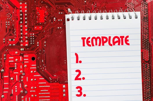 Red old dirty computer circuit board and text concept