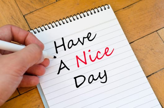 Have a nice day text concept write on notebook