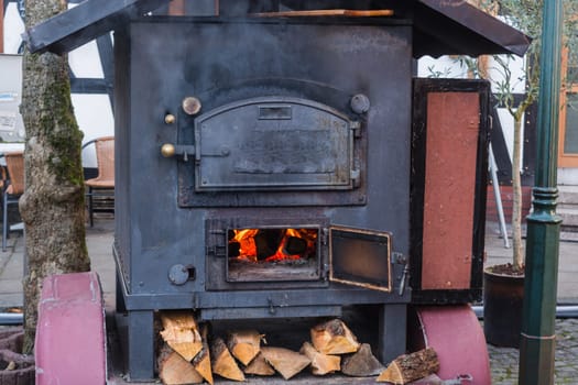 Mobile metal kitchen stove for cooking outdoor dining.