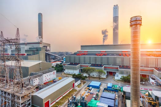 Hong Kong power station at sunset , Glow light of petrochemical industry