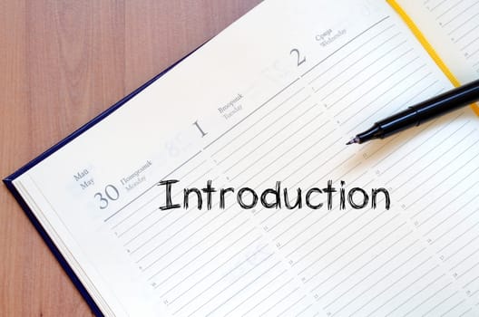 Introduction text concept write on notebook