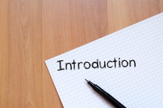 Introduction text concept write on notebook