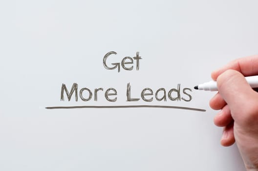 Human hand writing get more leads on whiteboard