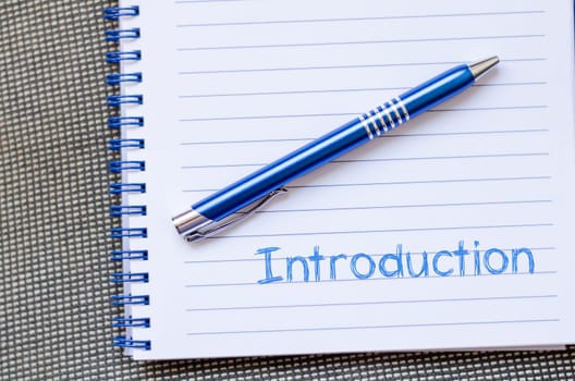 Introduction text concept write on notebook