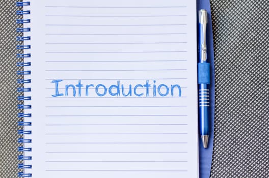 Introduction text concept write on notebook