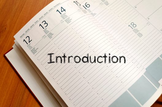 Introduction text concept write on notebook
