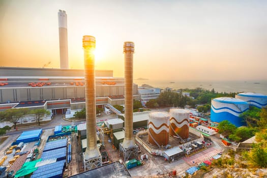 Hong Kong power station at sunset , Glow light of petrochemical industry