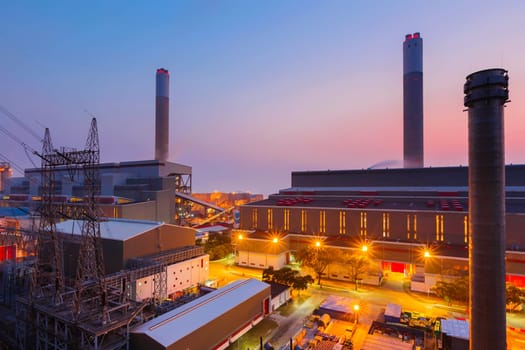 Glow light of petrochemical industry at sunset, hong kong