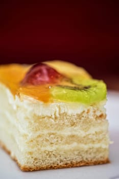 Piece of Fruit cake in a white plate