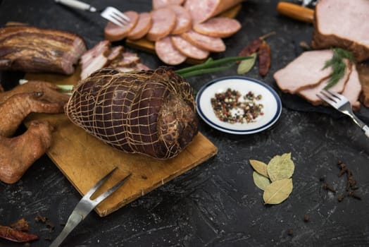Set of different meat food on black backgound