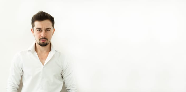 Man standing against white background
