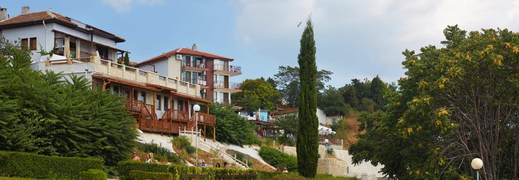 Nesebar, Bulgaria - August 30, 2013: Ancient architecture, trees and shrubs. Seaside resort and ancient old town Nesebar in Bulgaria. Bulgarian Black Sea Coast. UNESCO world heritage site. Panoramic shot.