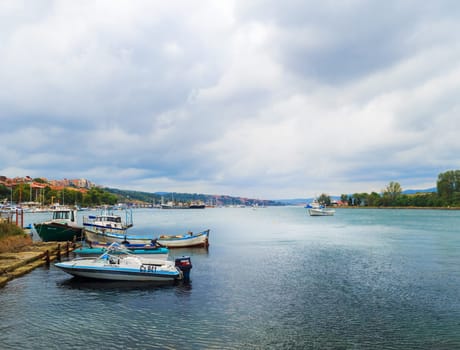 Sozopol, Bulgaria - September 06, 2014: Fishing boats at the pier in the harbor of the old Old town of Sozopol, Bulgaria. Bulgarian Black Sea Coast.