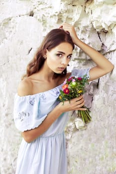 Beautiful girl with flowers